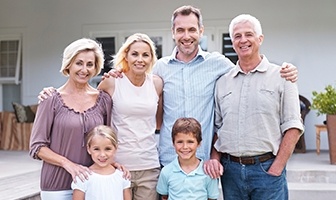 Three generations of family smiling together