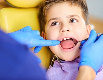 Child receiving dental exam