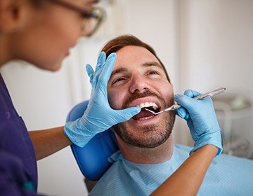 Man receiving dental exam