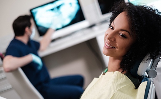 Smiling woman in dental chair