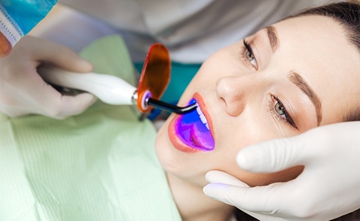 Patient receiving dental bonding