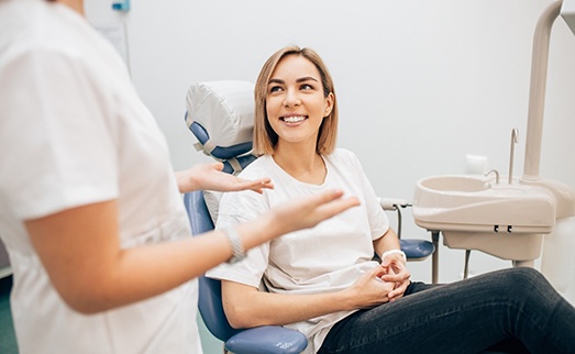 patient talking to dentist in Carlisle 