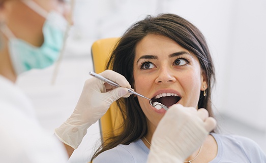 Patient receiving dental treatment