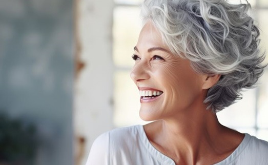 Profile view of smiling older woman