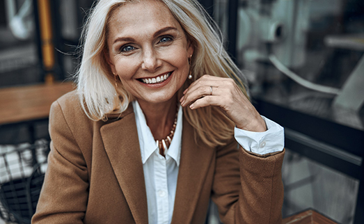 Woman smiling with veneers in Carlisle